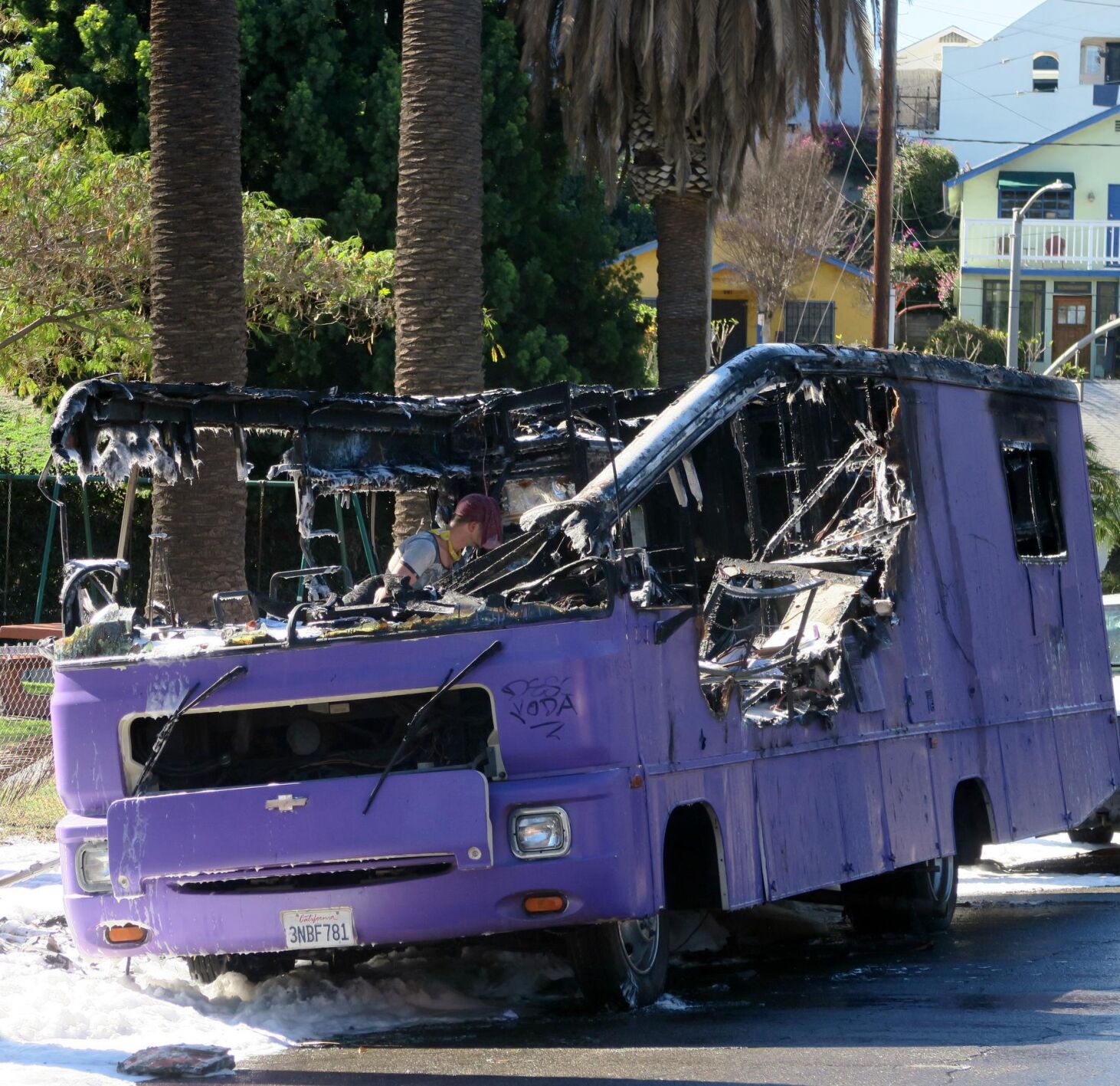 Burned wreckage of Echo Park purple bus